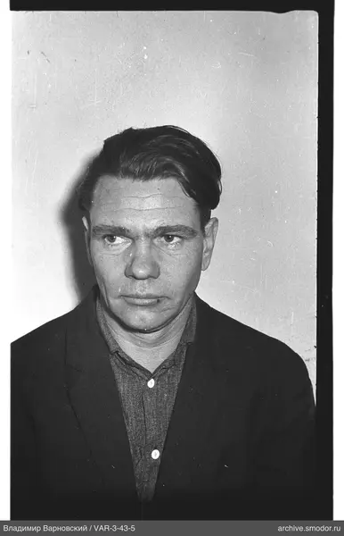 Portrait of a man in dark clothing