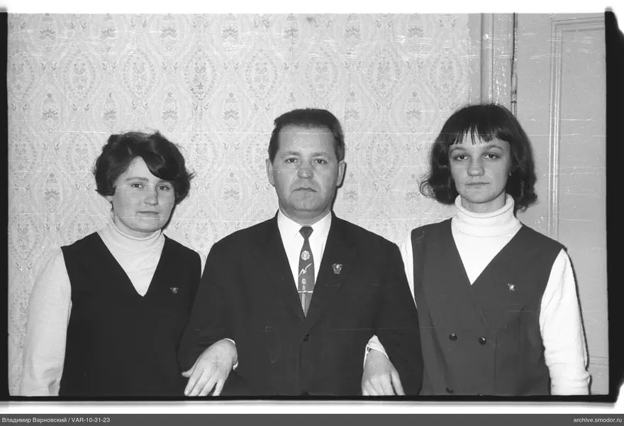 Group portrait with man and women