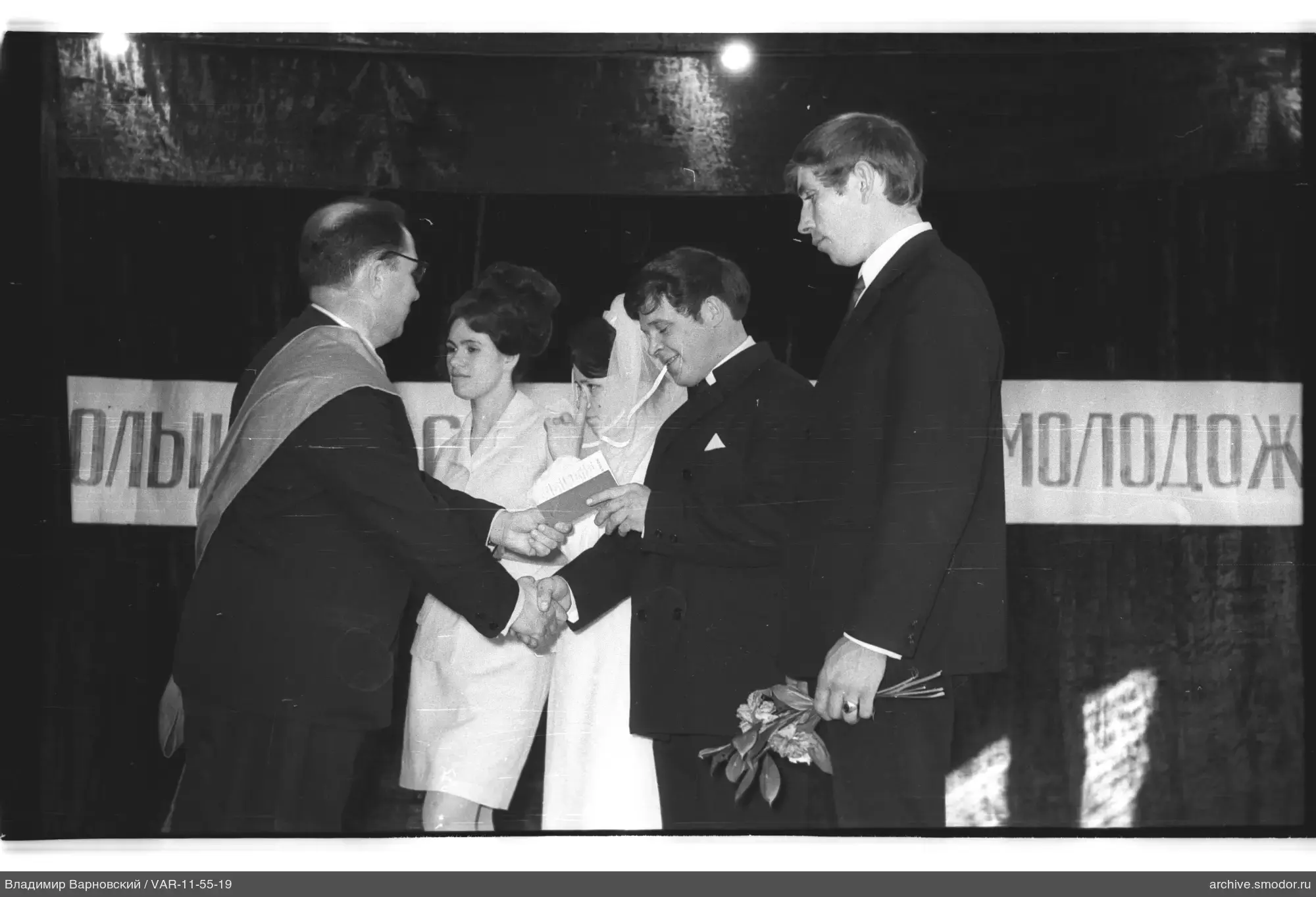 Men shaking hands at an event