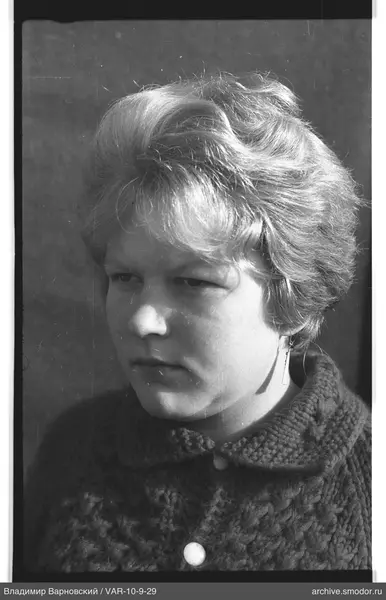 Portrait of a woman in a dark sweater