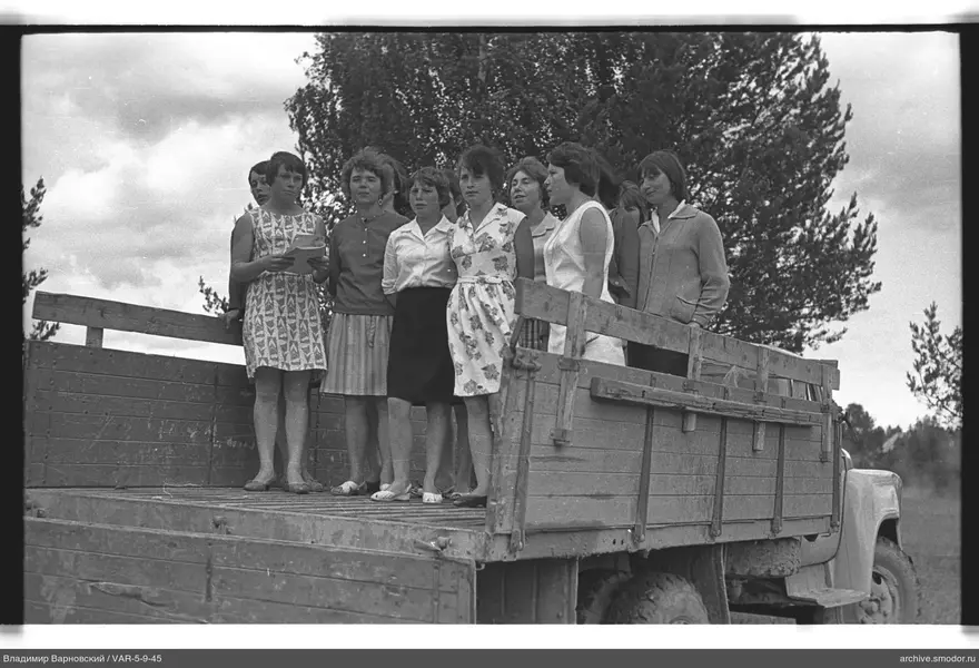 Group of women on a cargo truck