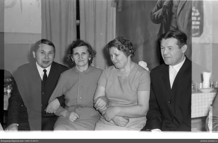 Group portrait of four people