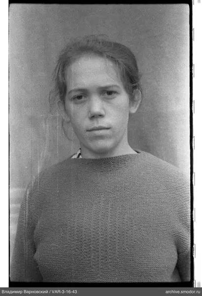 Portrait of a woman in a light sweater