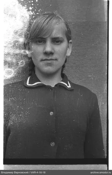 Portrait of a woman with two braids