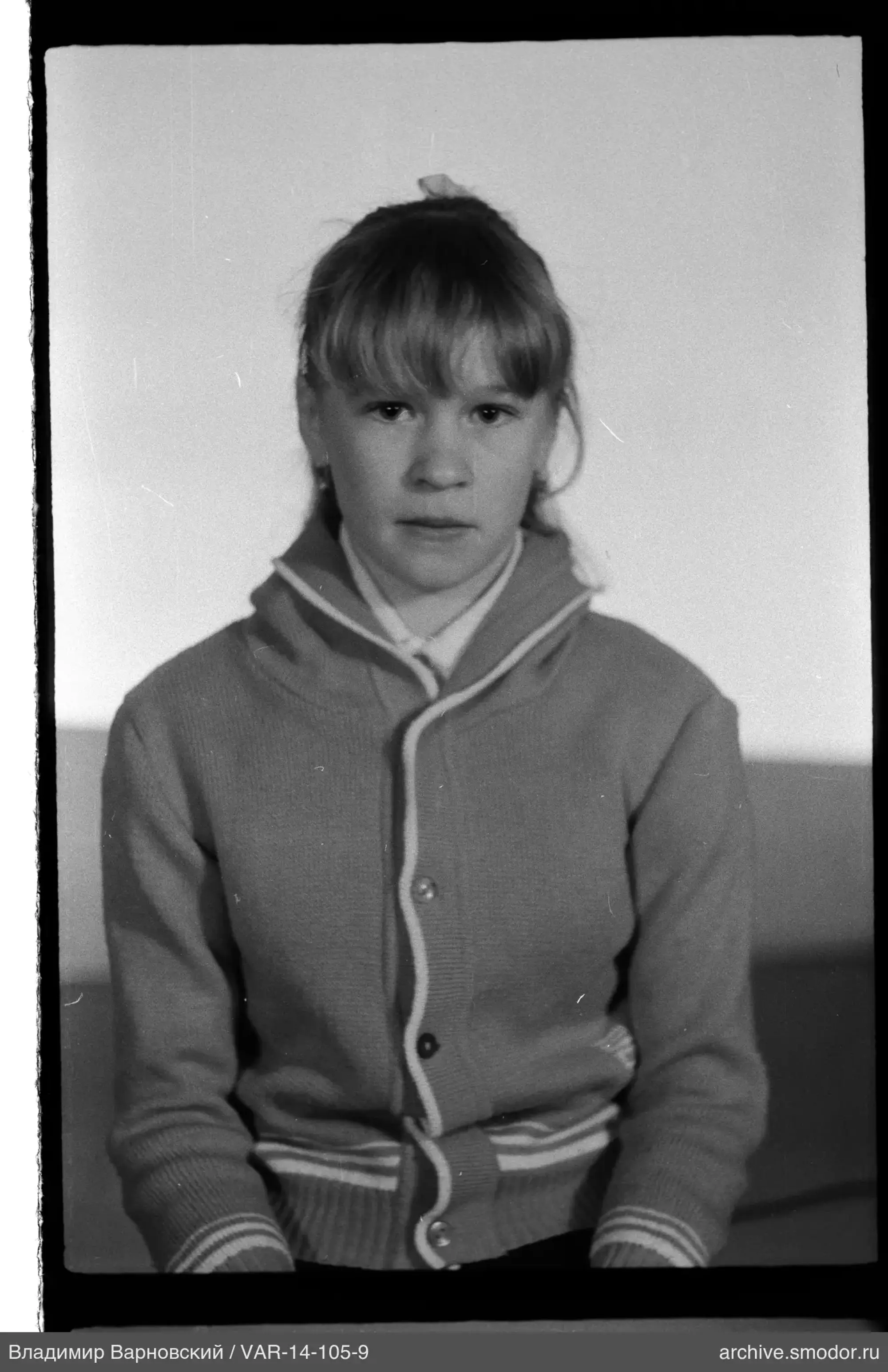 Girl's portrait in light sweater