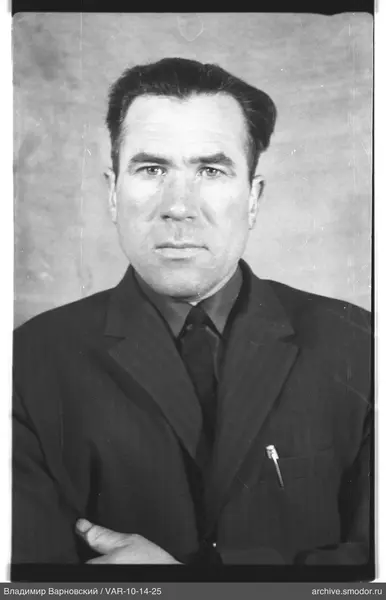 Portrait of a man in dark suit