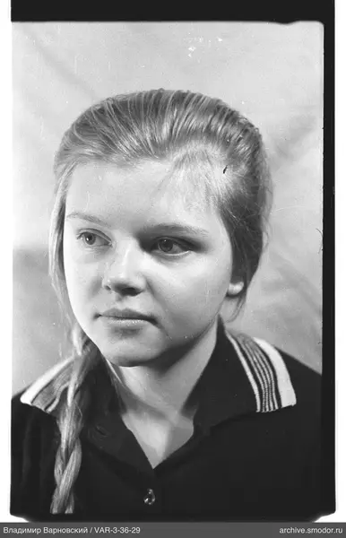 Portrait of a woman with braided hair
