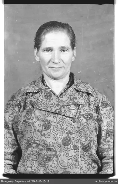 Portrait of a woman in a coat