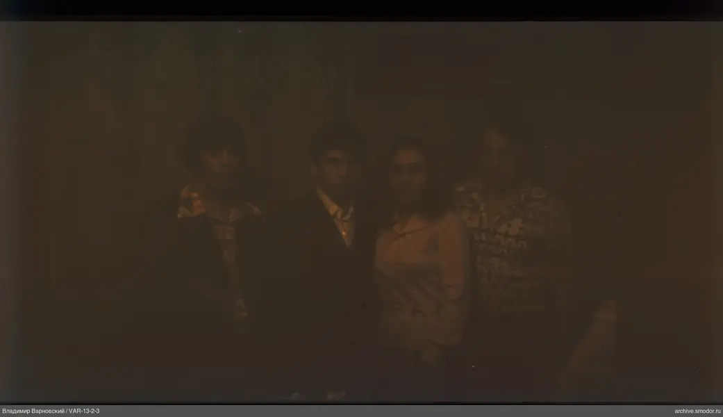 Group portrait of four people