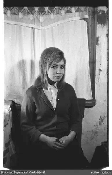 Portrait of a woman holding an object
