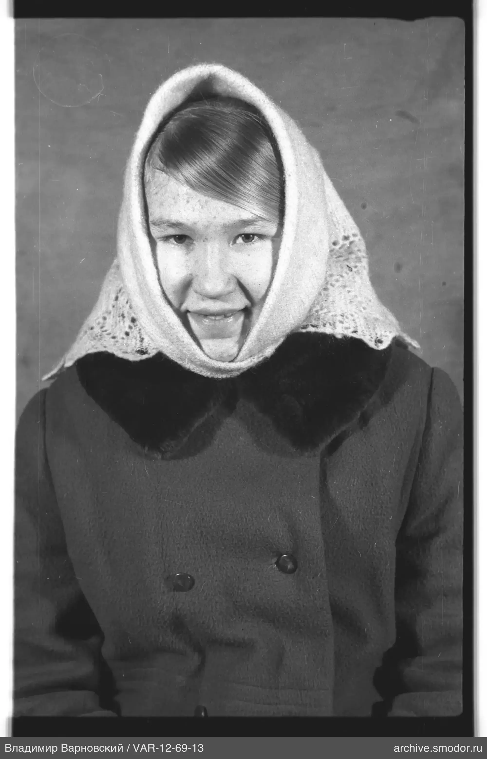 Portrait of a woman in a headscarf