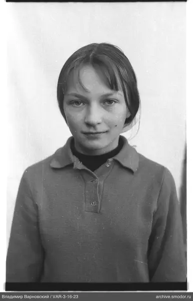 Portrait of a woman in a sweater and turtleneck