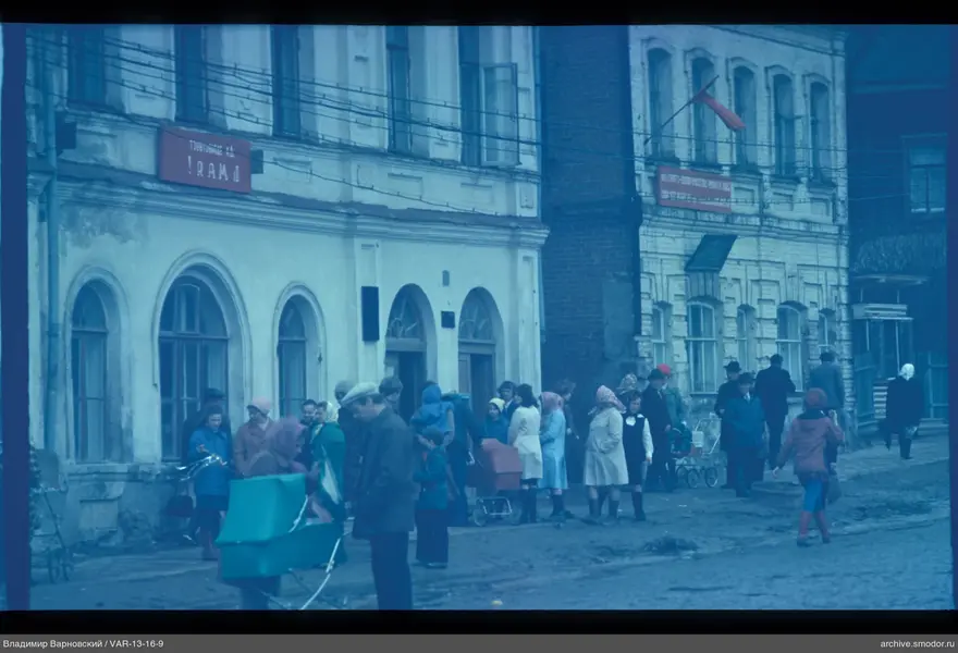 Group of people in front of buildings