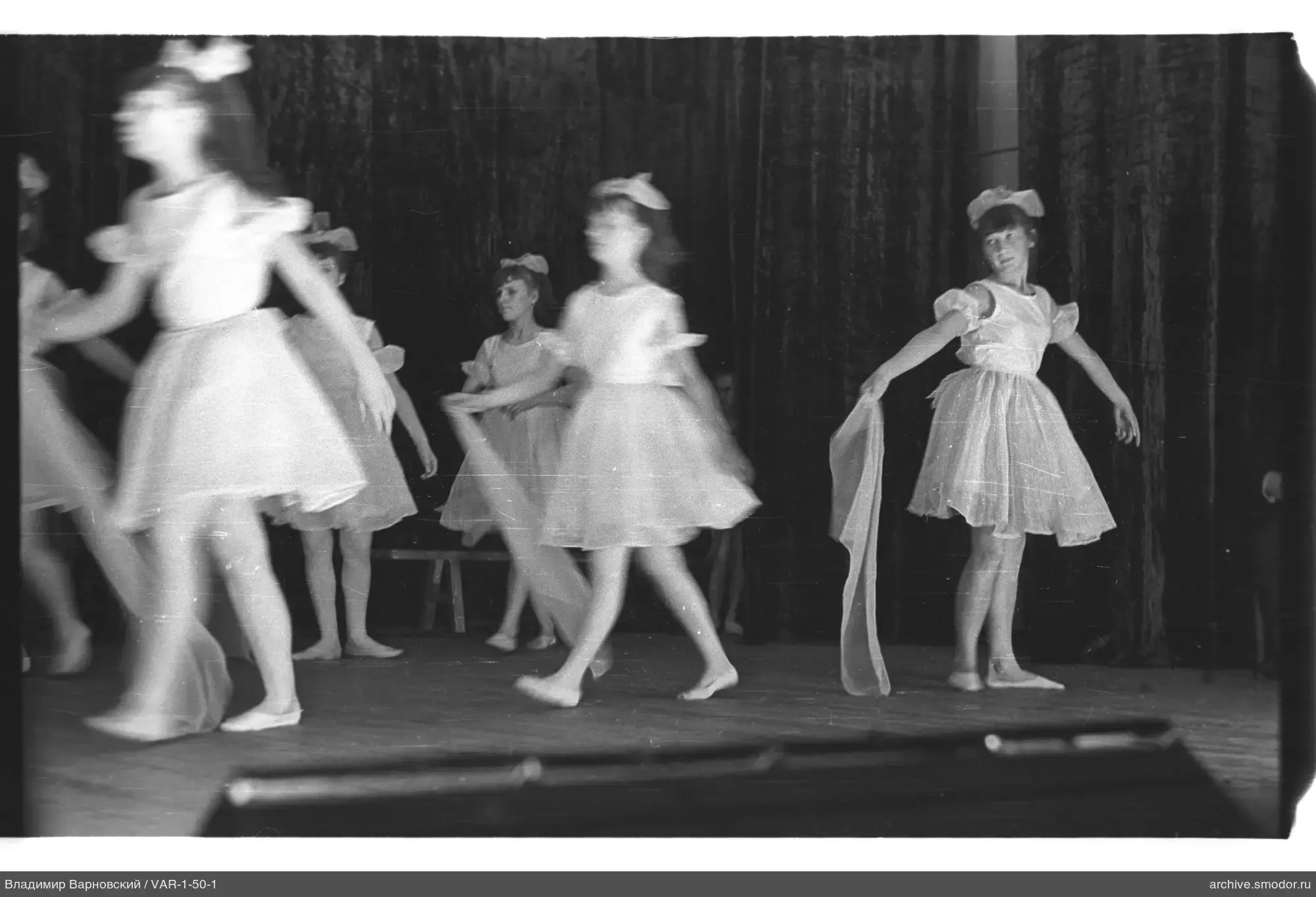 Girls on stage with ribbon