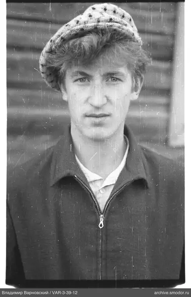 Portrait of a man in a hat and jacket