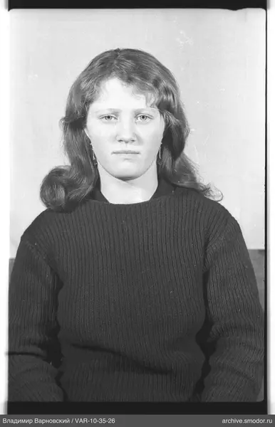 Portrait of a woman in a dark sweater
