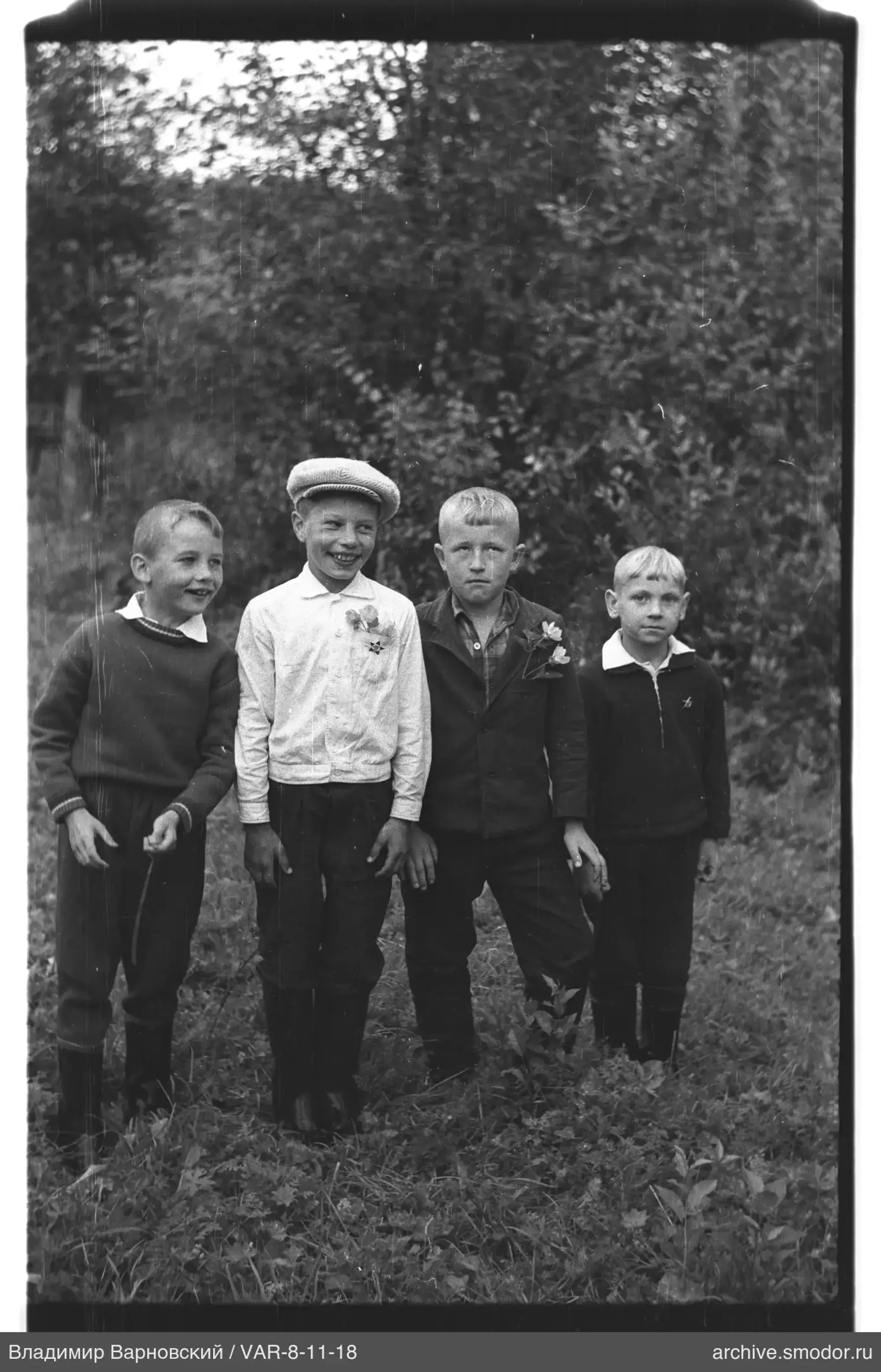 Group portrait of four boys