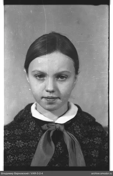 Girl's portrait in jacket and bow tie