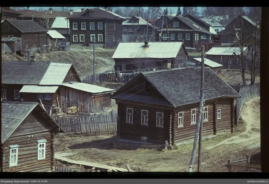 Wooden houses with gable roofs