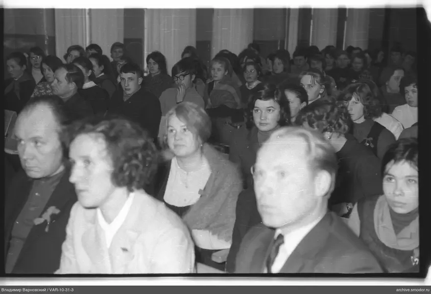 People seated in hall at event