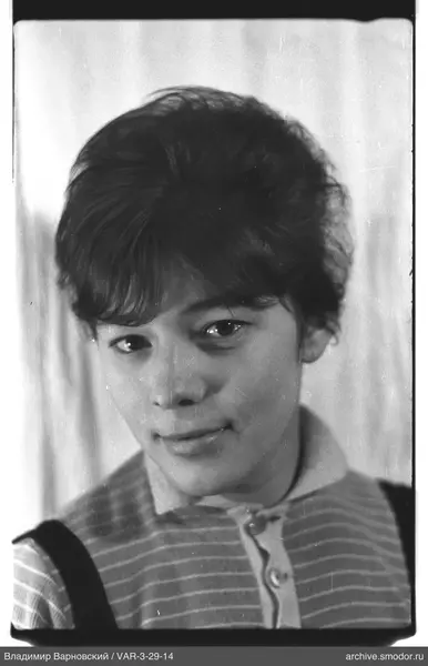 Portrait of a woman in a striped shirt
