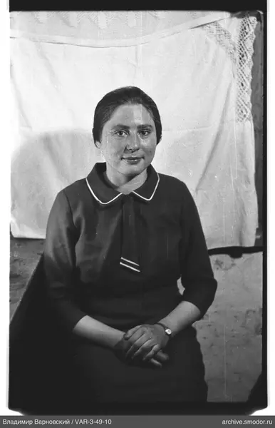 Portrait of a woman in a dark dress