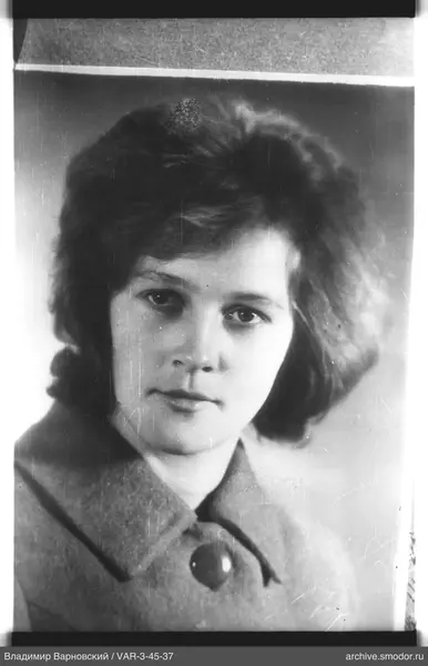 Portrait of a woman in a coat