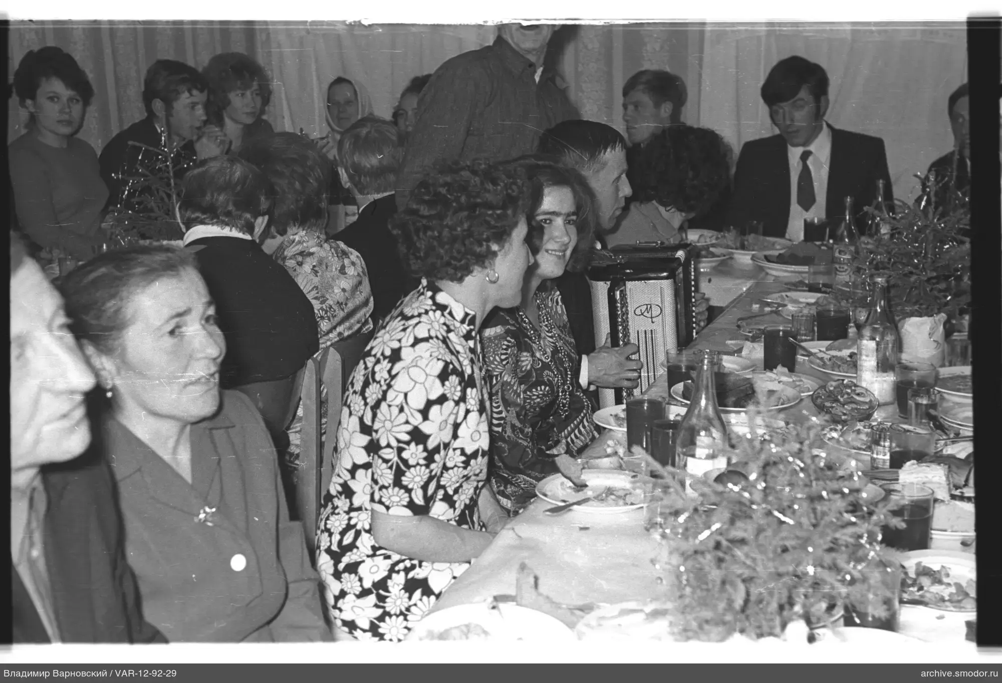 Men and women at a festive table