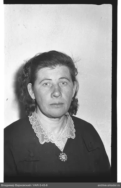 Portrait of a woman in a dark dress