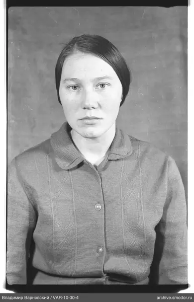 Portrait of a woman in a knitted jacket