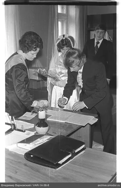 Signing a document at an event