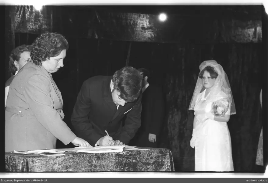 Signing documents at an event