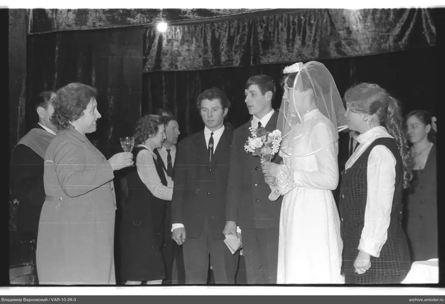 Group photo with central man and woman