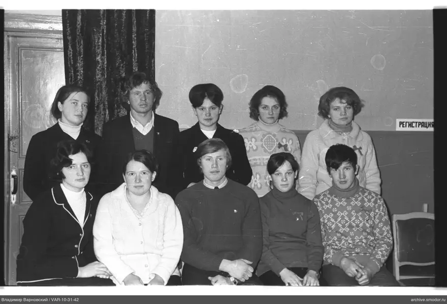 Group portrait of nine people