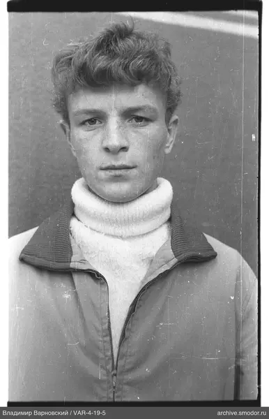 Portrait of a man in a sweater and jacket