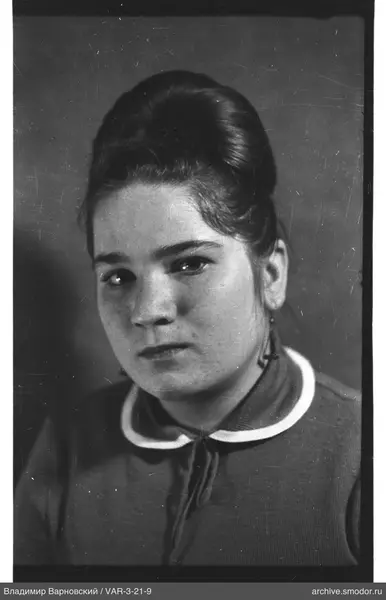 Portrait of a woman with a bun