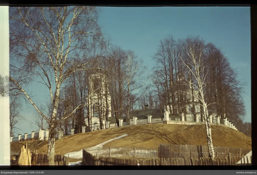 Building with two white towers on the hilltop