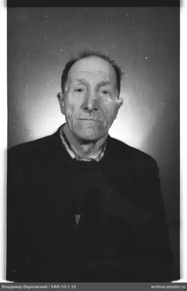 Portrait of a man in dark clothing