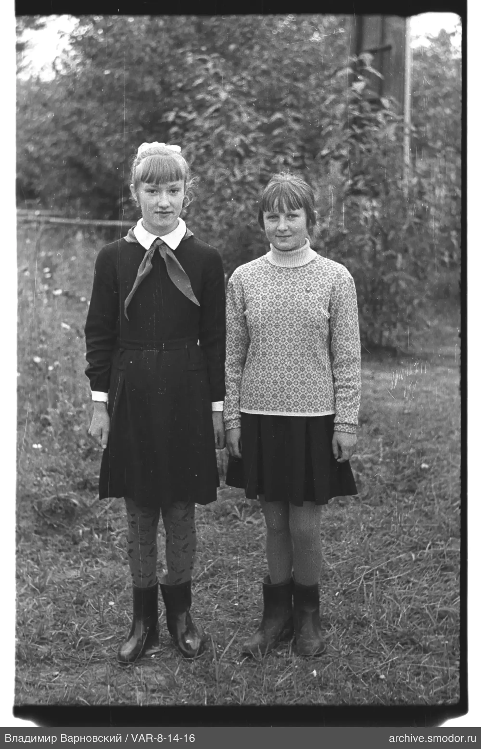 Two girls on the grass
