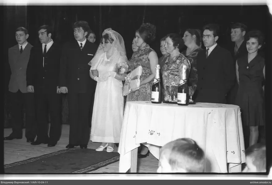 Group portrait with bouquet and gift
