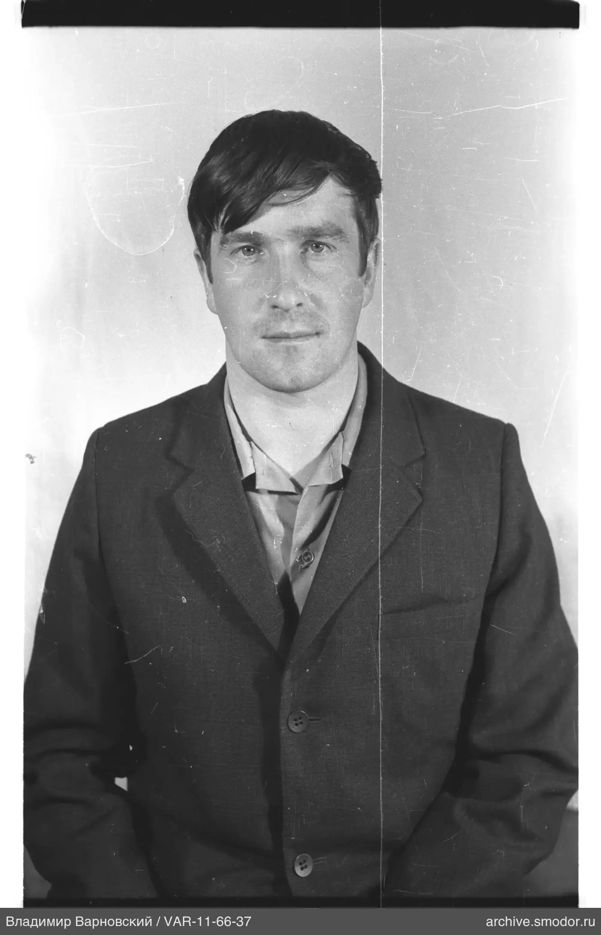 Portrait of a man in a jacket and light shirt