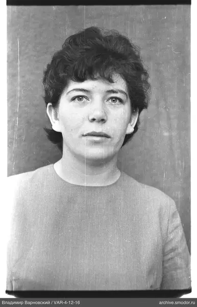 Portrait of a woman with short dark hair