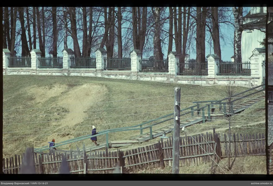 People climbing a wooden ladder