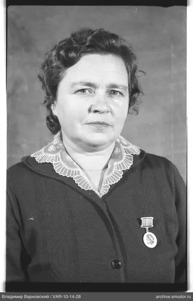 Portrait of a woman with a medal