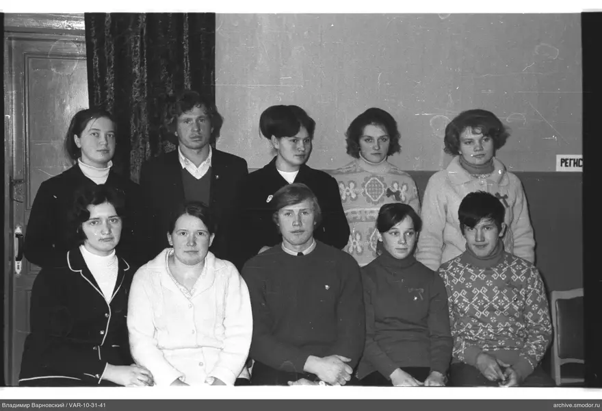 Group portrait of nine people