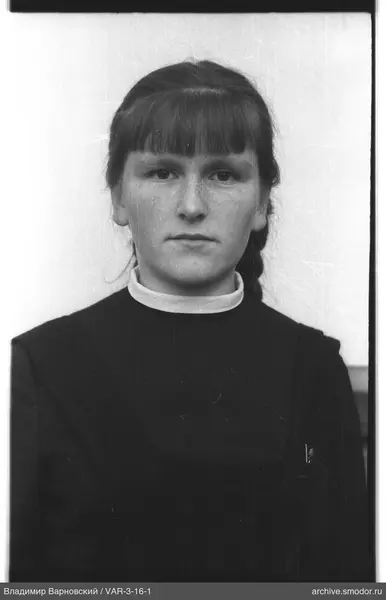Portrait of a woman in a dark dress
