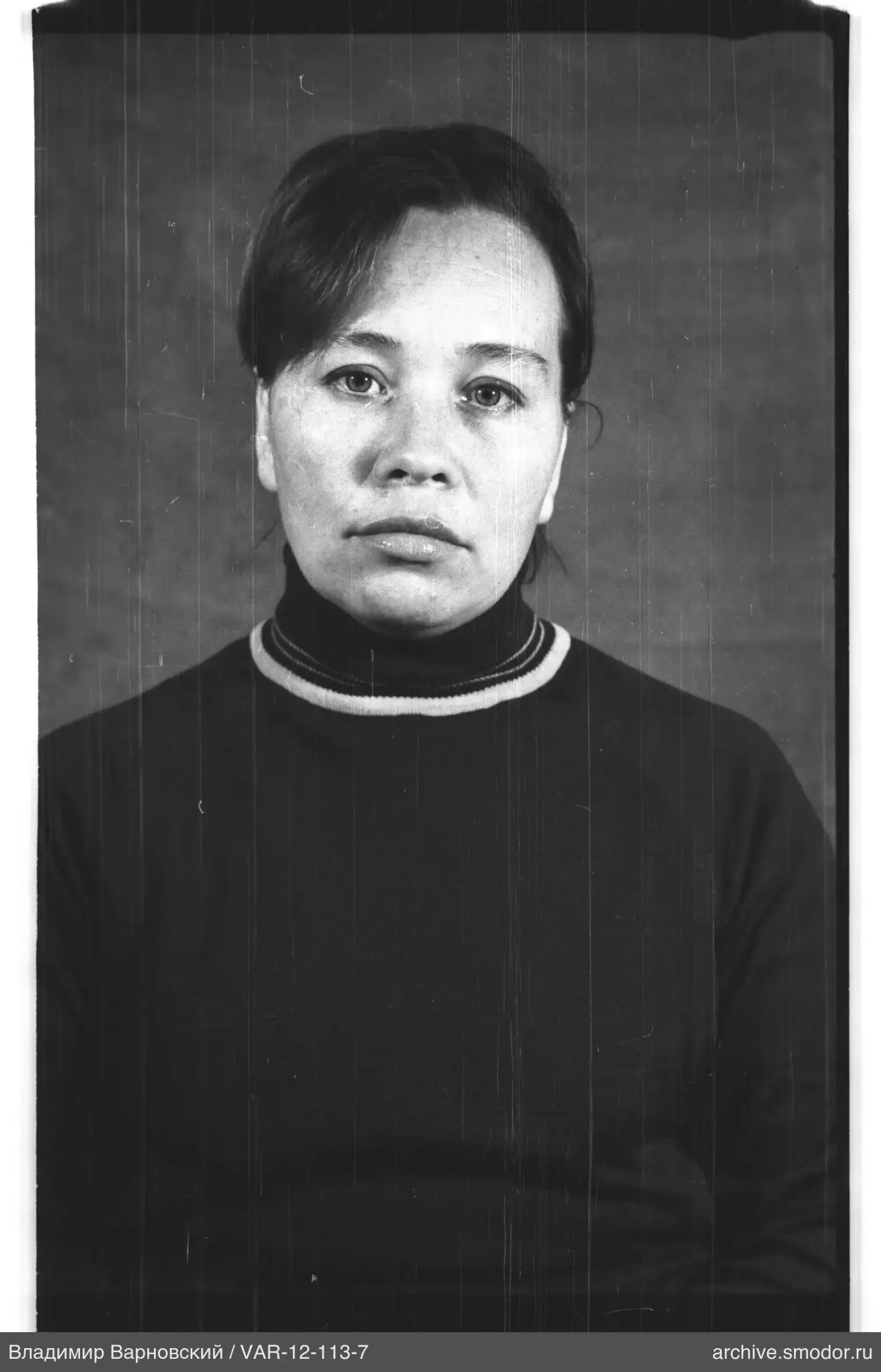 Portrait of a woman in a dark sweater