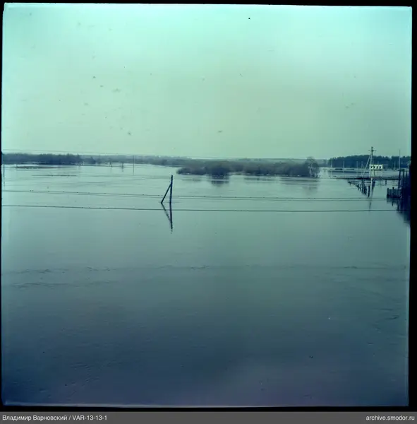 Water surface with power line supports