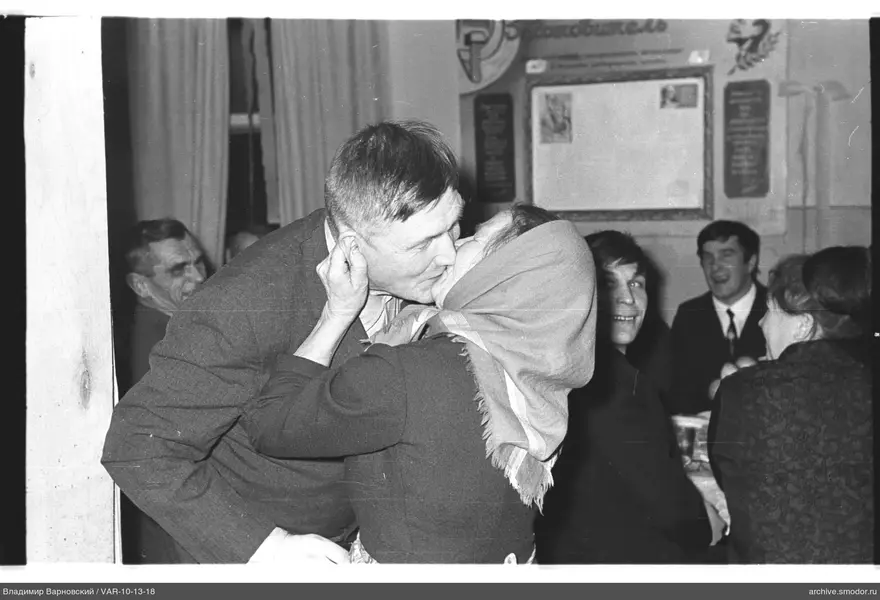 Kissing man and woman
