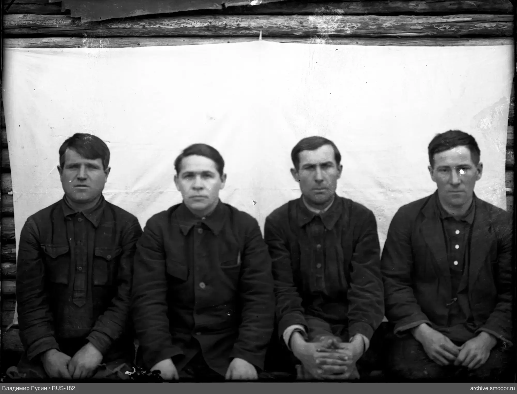 Group of men on a bench